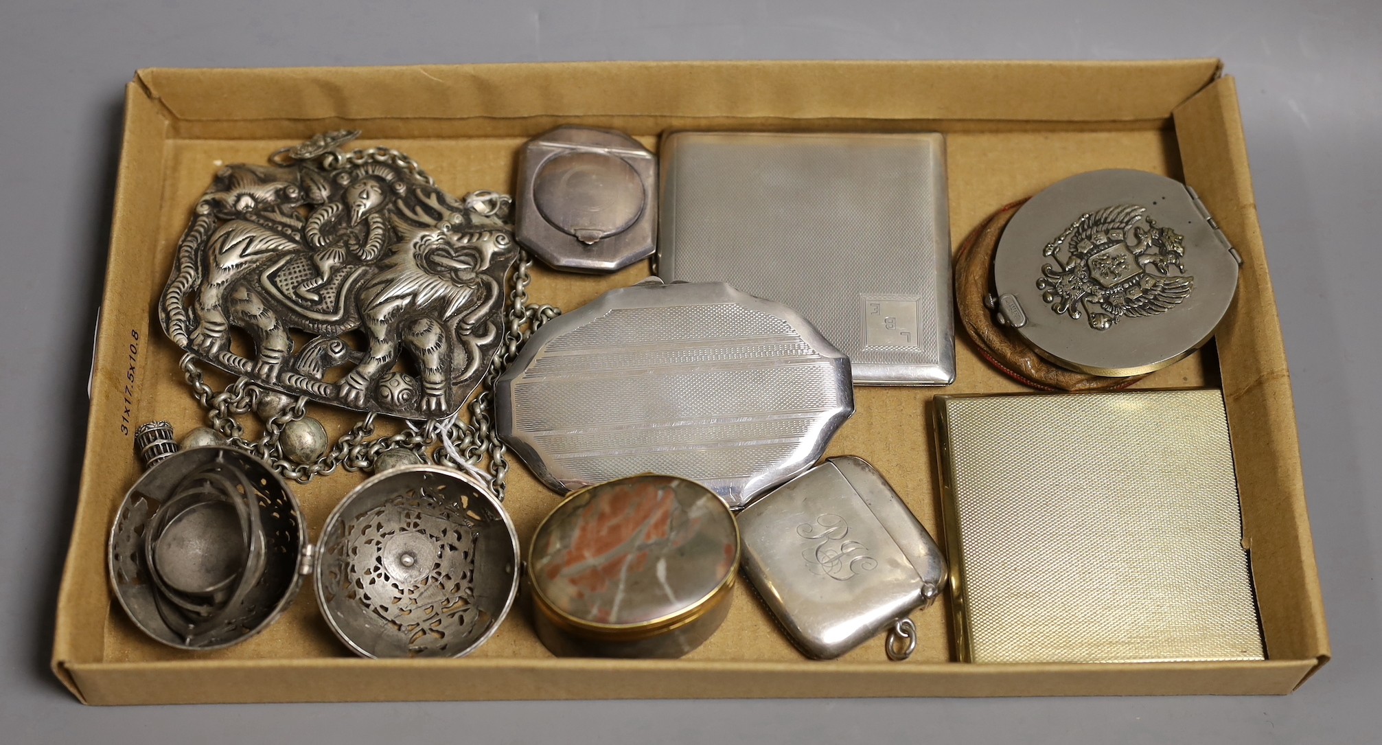 An engine turned silver cigarette case, two silver compacts and a vesta case, gross 7oz, an 18th century gilt mounted hardstone snuff box (a.f.), and sundries